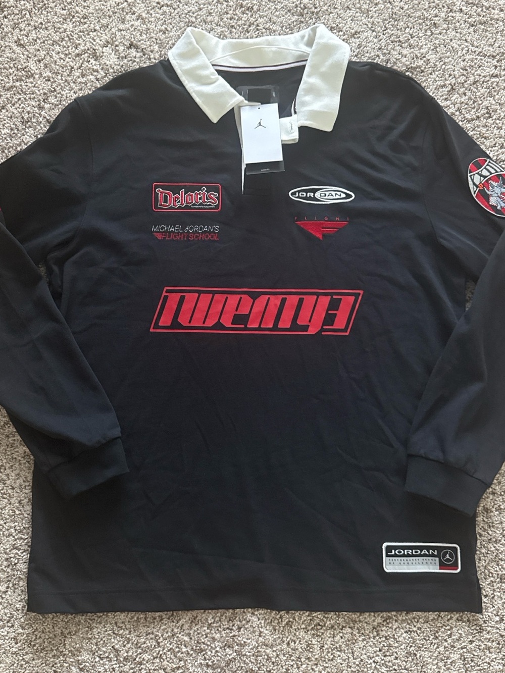 Jordan Black Long-Sleeve Polo with White Collar and Red Graphics